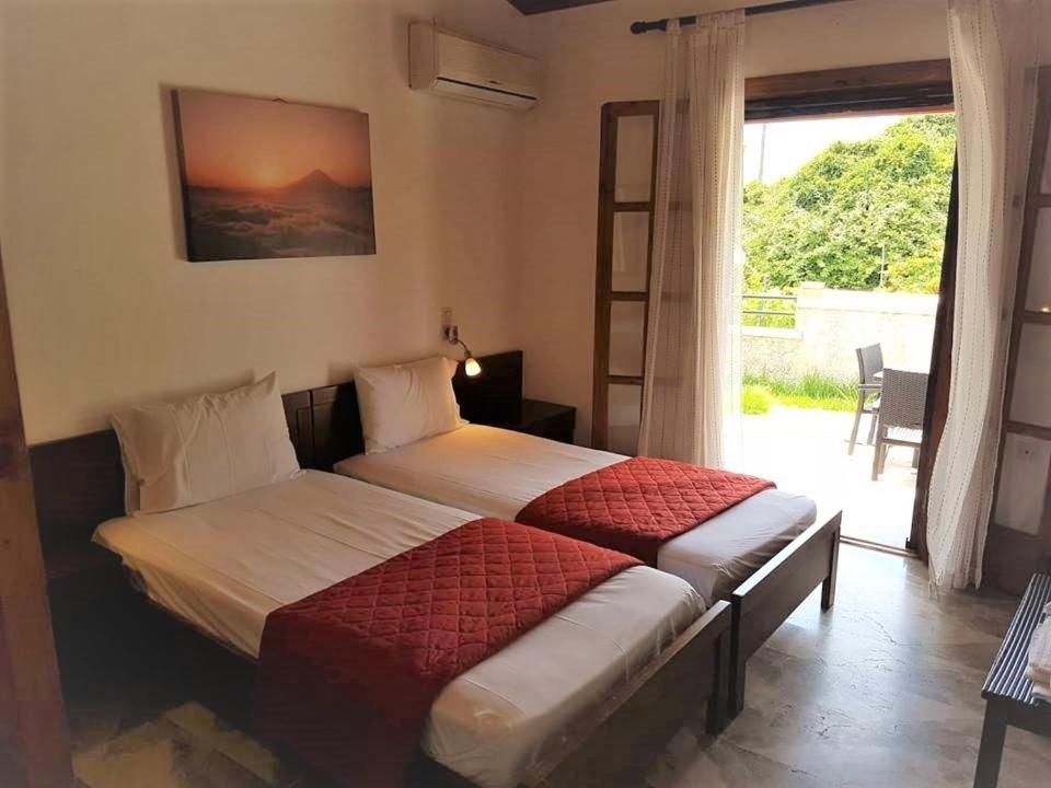 Amalia Cottages Agios Gordios  Bagian luar foto